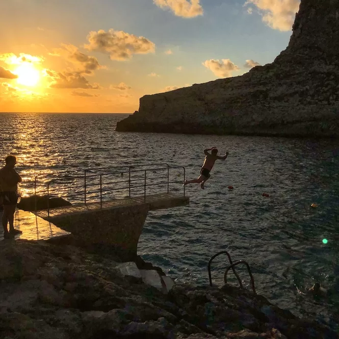 Thing to Do in Gozo - Swimming in Xlendi Bay