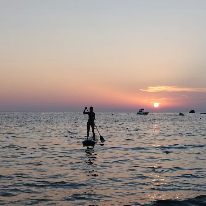 Best Places to See Sunsets in Malta - Paddle Boarding in Ghajn Tuffieha During the SunsetJPG