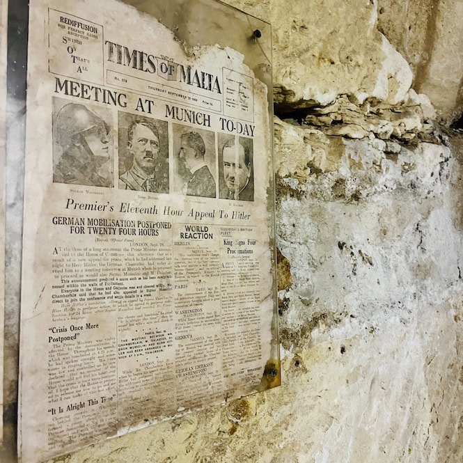 Historical 'Times of Malta' newspaper displayed at the war shelters of Casa Rocca Piccola, Valletta.